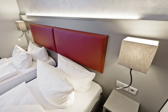 Imagen de la habitación del Hotel Median. Foto 13