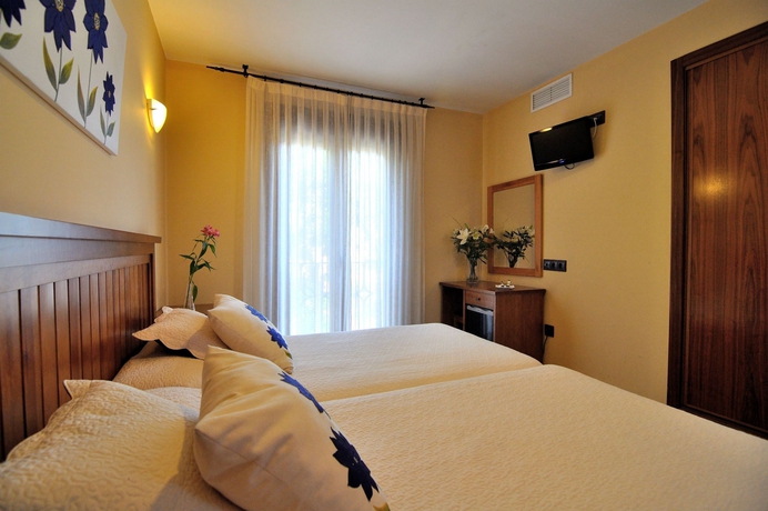 Imagen de la habitación del Hotel Medina De Toledo. Foto 10