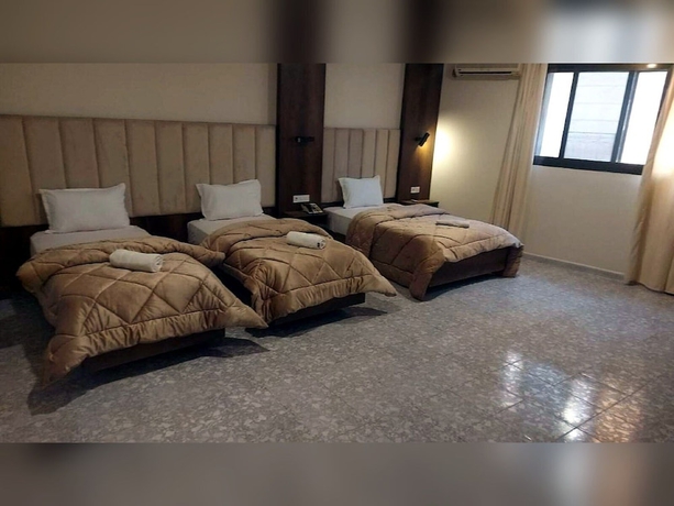 Imagen de la habitación del Hotel Medina Downtown. Foto 10