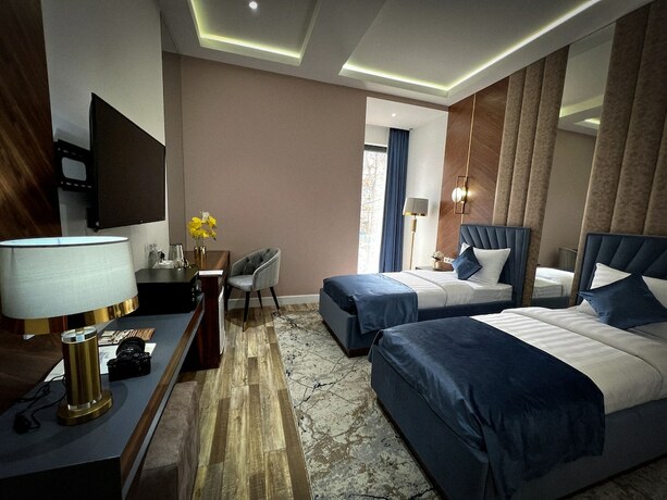 Imagen de la habitación del Hotel MedinaTown. Foto 16