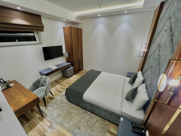 Imagen de la habitación del Hotel MedinaTown. Foto 17
