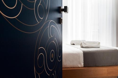 Imagen de la habitación del Hotel Medinblu. Foto 6