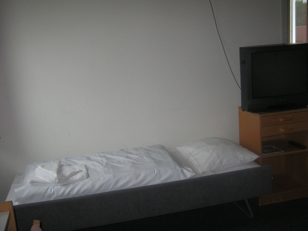 Imagen de la habitación del Hotel Medio. Foto 7