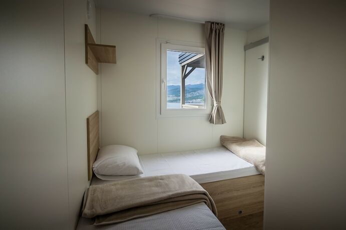 Imagen de la habitación del Hotel Mediteran kamp Mobile Homes in Camping Klenovica. Foto 17