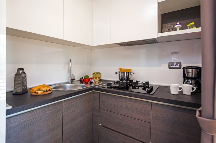 Imagen de la habitación del Hotel Mediteran kamp Mobile Homes in Camping Ljutic. Foto 12