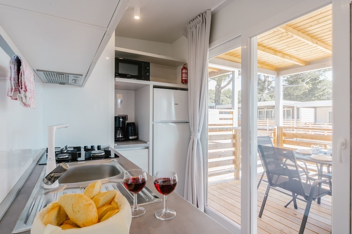 Imagen de la habitación del Hotel Mediteran kamp Mobile Homes in Camping Ljutic. Foto 13