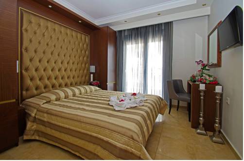 Imagen de la habitación del Hotel Mediterranean Resort, Paralia. Foto 6