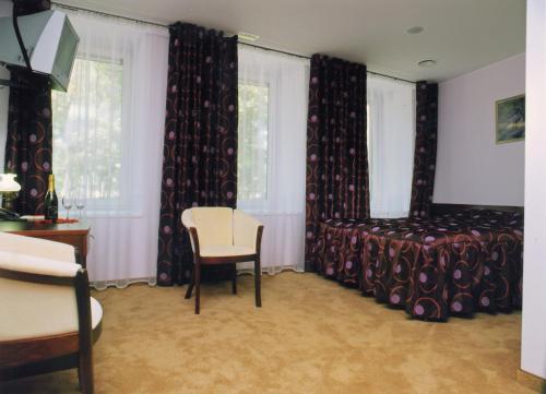 Imagen de la habitación del Hotel Medūna Central. Foto 6
