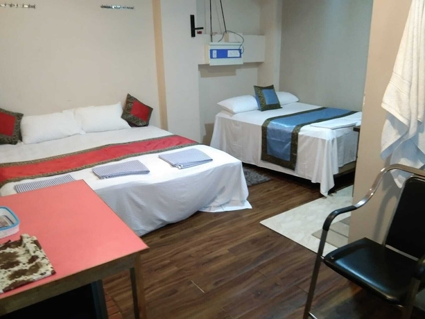 Imagen de la habitación del Hotel Medwin Kashi Dham. Foto 2