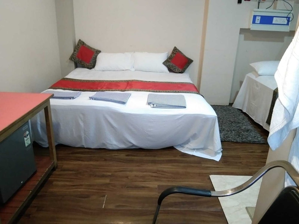 Imagen de la habitación del Hotel Medwin Kashi Dham. Foto 7
