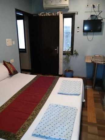 Imagen de la habitación del Hotel Medwin Kashi Dham. Foto 8