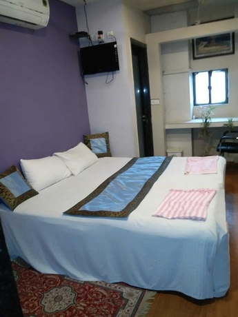 Imagen de la habitación del Hotel Medwin Kashi Dham. Foto 9