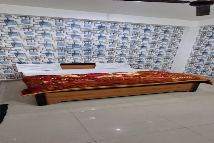 Imagen de la habitación del Hotel MeenakshI Palace Kanpur. Foto 10
