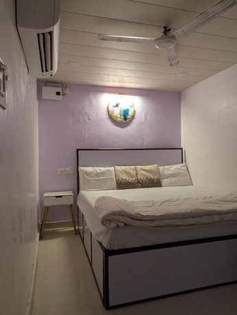 Imagen de la habitación del Hotel Meenakshi Guest House. Foto 15