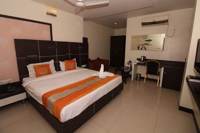 Imagen de la habitación del Hotel Meera, Raipur. Foto 9