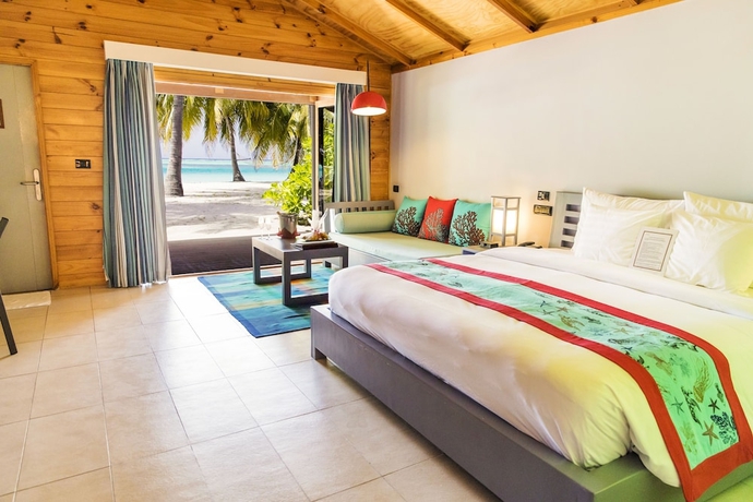 Imagen de la habitación del Hotel Meeru Maldives Resort Island. Foto 2