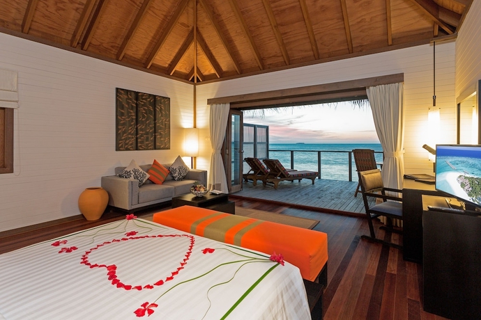 Imagen de la habitación del Hotel Meeru Maldives Resort Island. Foto 9