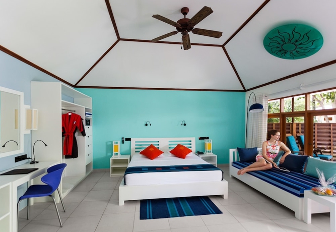 Imagen de la habitación del Hotel Meeru Maldives Resort Island. Foto 11