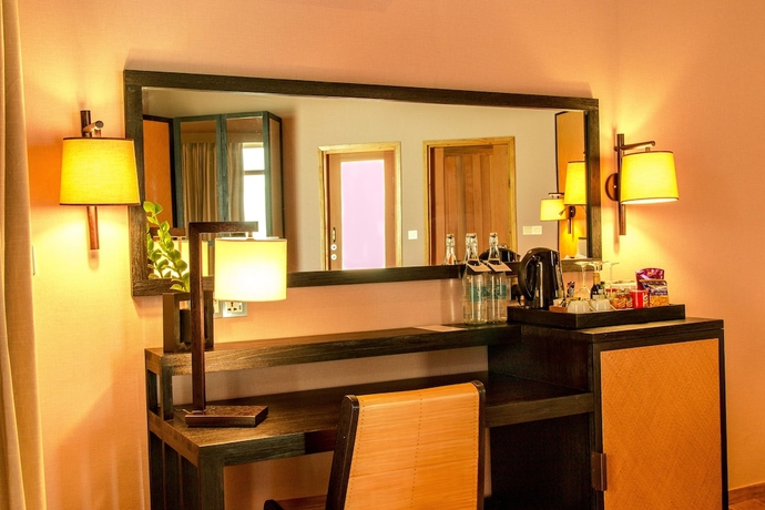 Imagen de la habitación del Hotel Meeru Maldives Resort Island. Foto 13