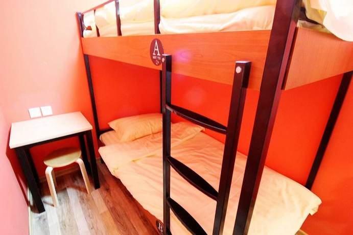 Imagen de la habitación del Hotel Meet Fish International Youth Hostel. Foto 13