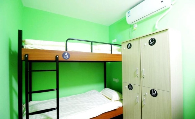 Imagen de la habitación del Hotel Meet Fish International Youth Hostel. Foto 17