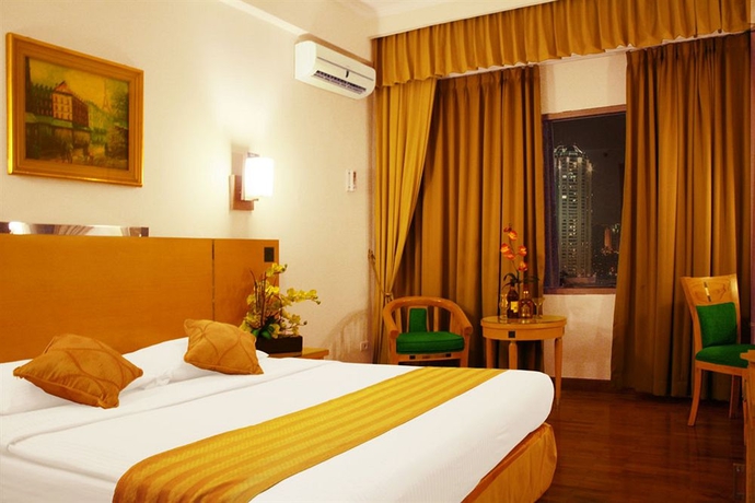 Imagen de la habitación del Hotel Mega Anggrek and Convention. Foto 4