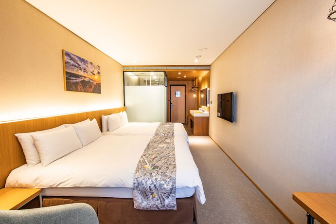 Imagen de la habitación del Hotel Mega, Chiayi City. Foto 6
