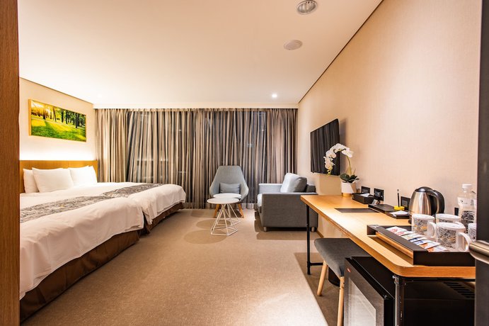 Imagen de la habitación del Hotel Mega, Chiayi City. Foto 14