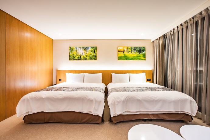 Imagen de la habitación del Hotel Mega, Chiayi City. Foto 15