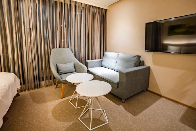 Imagen de la habitación del Hotel Mega, Chiayi City. Foto 16