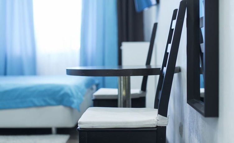 Imagen de la habitación del Hotel MegaStay. Foto 16