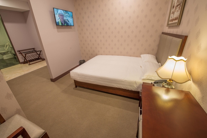 Imagen de la habitación del Hotel Megaboom City. Foto 7