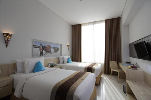 Imagen de la habitación del Hotel Megaland. Foto 5