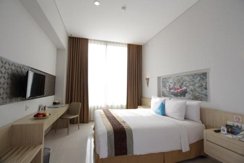 Imagen de la habitación del Hotel Megaland. Foto 7
