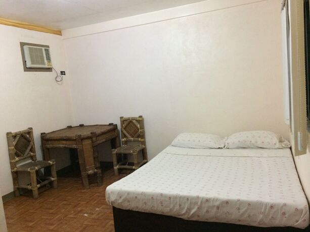 Imagen de la habitación del Hotel Megan\'s Paradisio Beach Resort. Foto 18