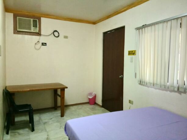 Imagen de la habitación del Hotel Megan\'s Paradisio Beach Resort. Foto 20