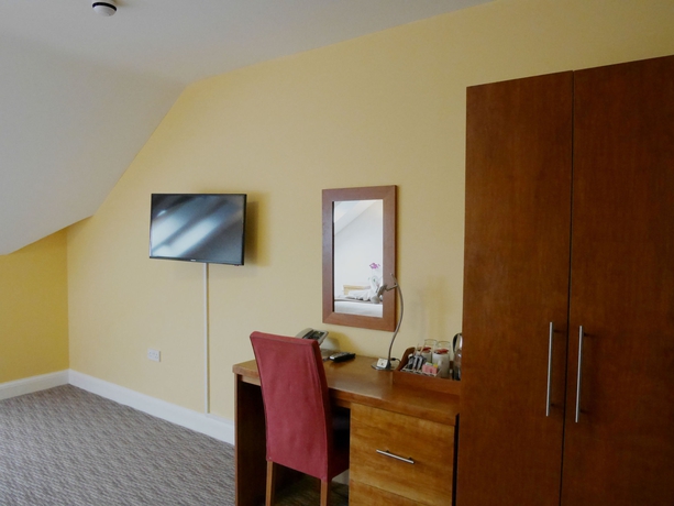 Imagen de la habitación del Hotel Mehfil. Foto 13