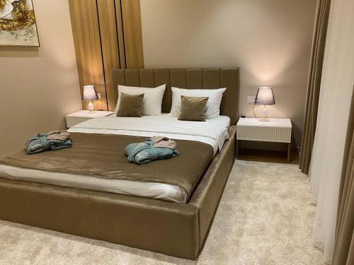 Imagen de la habitación del Hotel MehmonsaroyGrand. Foto 15