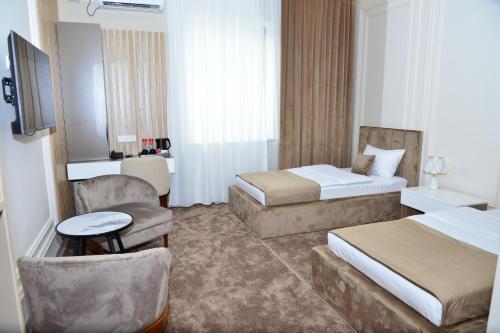 Imagen general del Hotel MehmonsaroyGrand. Foto 3