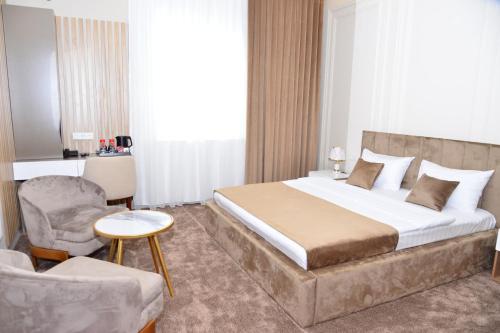 Imagen general del Hotel MehmonsaroyGrand. Foto 7