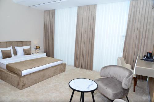 Imagen general del Hotel MehmonsaroyGrand. Foto 8