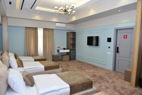 Imagen general del Hotel MehmonsaroyGrand. Foto 10