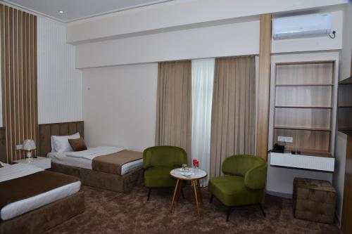 Imagen general del Hotel MehmonsaroyGrand. Foto 12