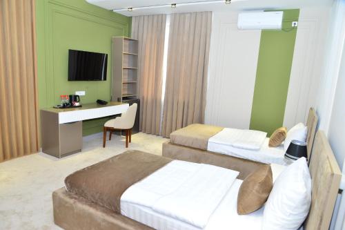 Imagen general del Hotel MehmonsaroyGrand. Foto 14