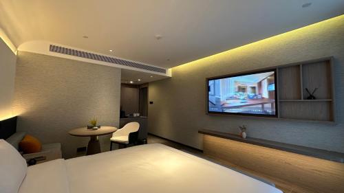 Imagen de la habitación del Hotel Mehood Ankang Ziyang. Foto 15