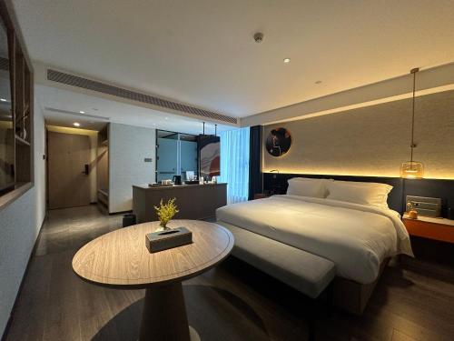 Imagen de la habitación del Hotel Mehood Ankang Ziyang. Foto 16