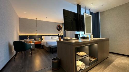 Imagen de la habitación del Hotel Mehood Ankang Ziyang. Foto 17