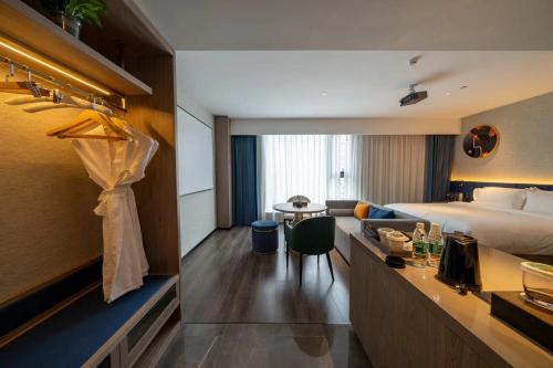 Imagen de la habitación del Hotel Mehood Ankang Ziyang. Foto 18