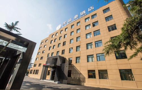 Imagen general del Hotel Mehood Dalian Hi-tech Wanda Plaza Xinghai. Foto 3
