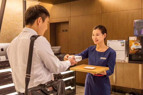 Imagen general del Hotel Mehood Dalian Hi-tech Wanda Plaza Xinghai. Foto 6